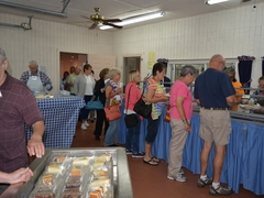 Queueing up in the food line.